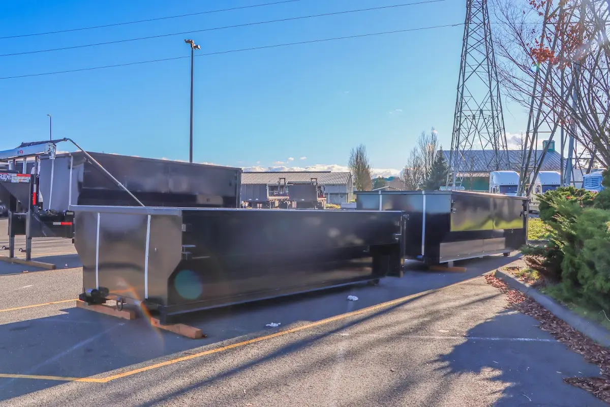 Roll-off dumpster ready for waste disposal at job site for Demolition Dumpster Rental in Tunkhannock